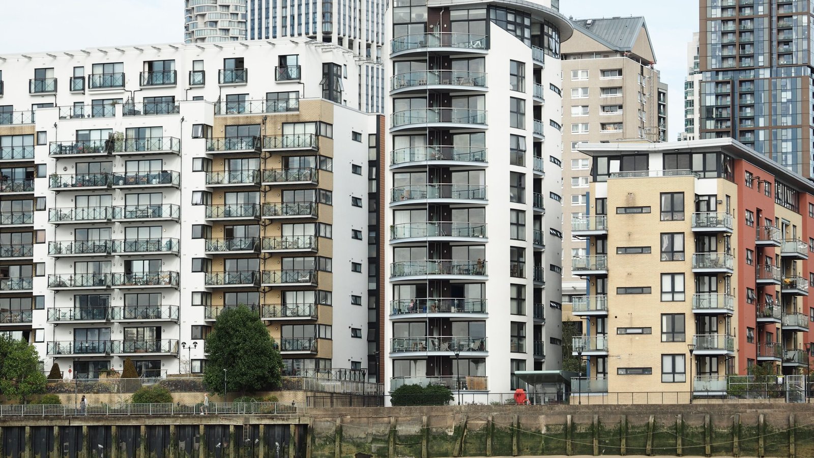 High-rise apartment buildings captured in an urban environment with modern architecture.